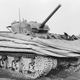 Duplex-drive Sherman with canvas screens lowered.
